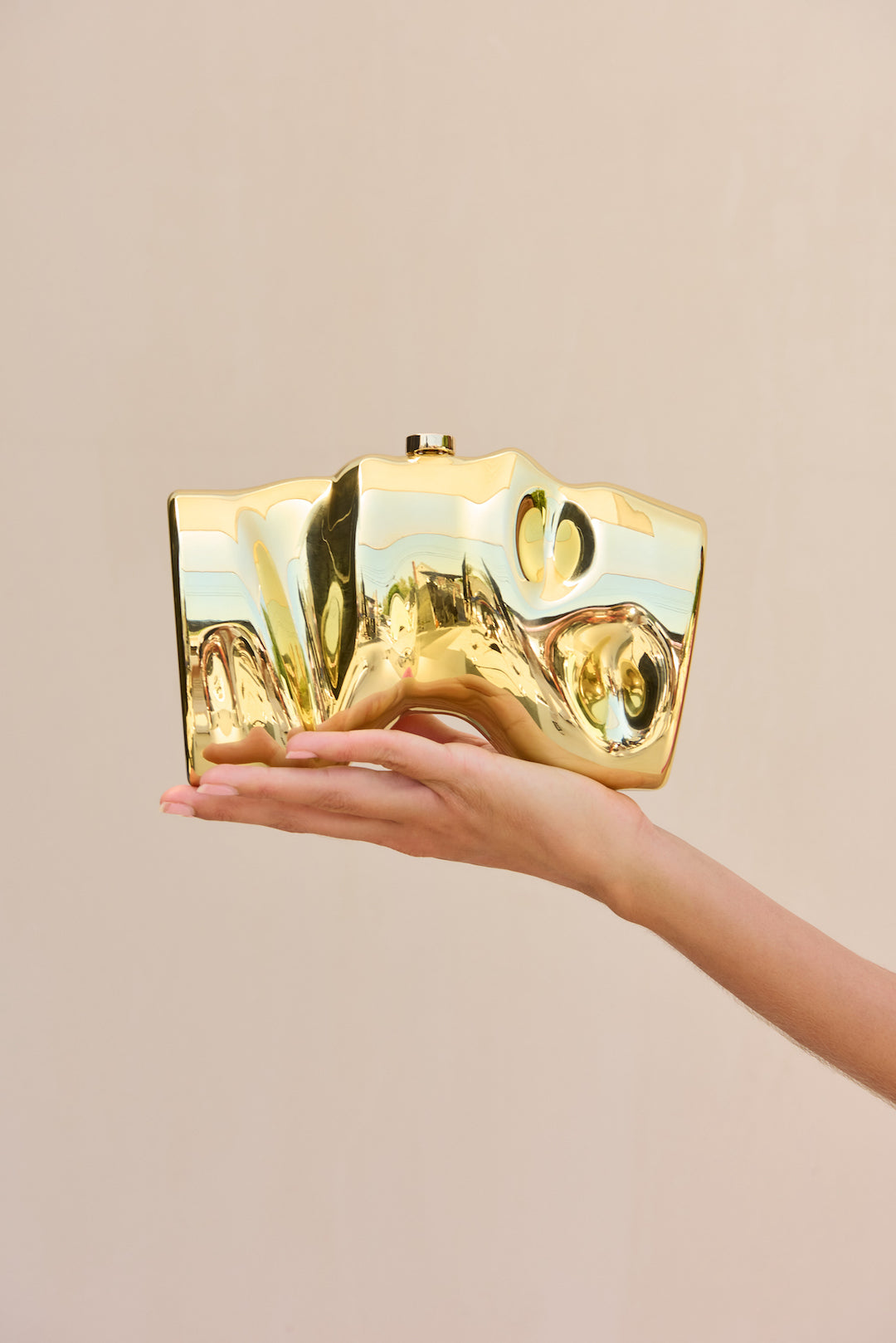 CULT GAIA SCRUNCH CLUTCH IN SHINY GOLD