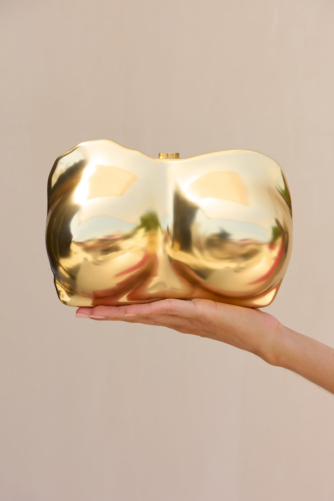 CULT GAIA REINA CLUTCH IN BRUSHED BRASS