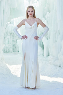Image of model wearing a white gown.