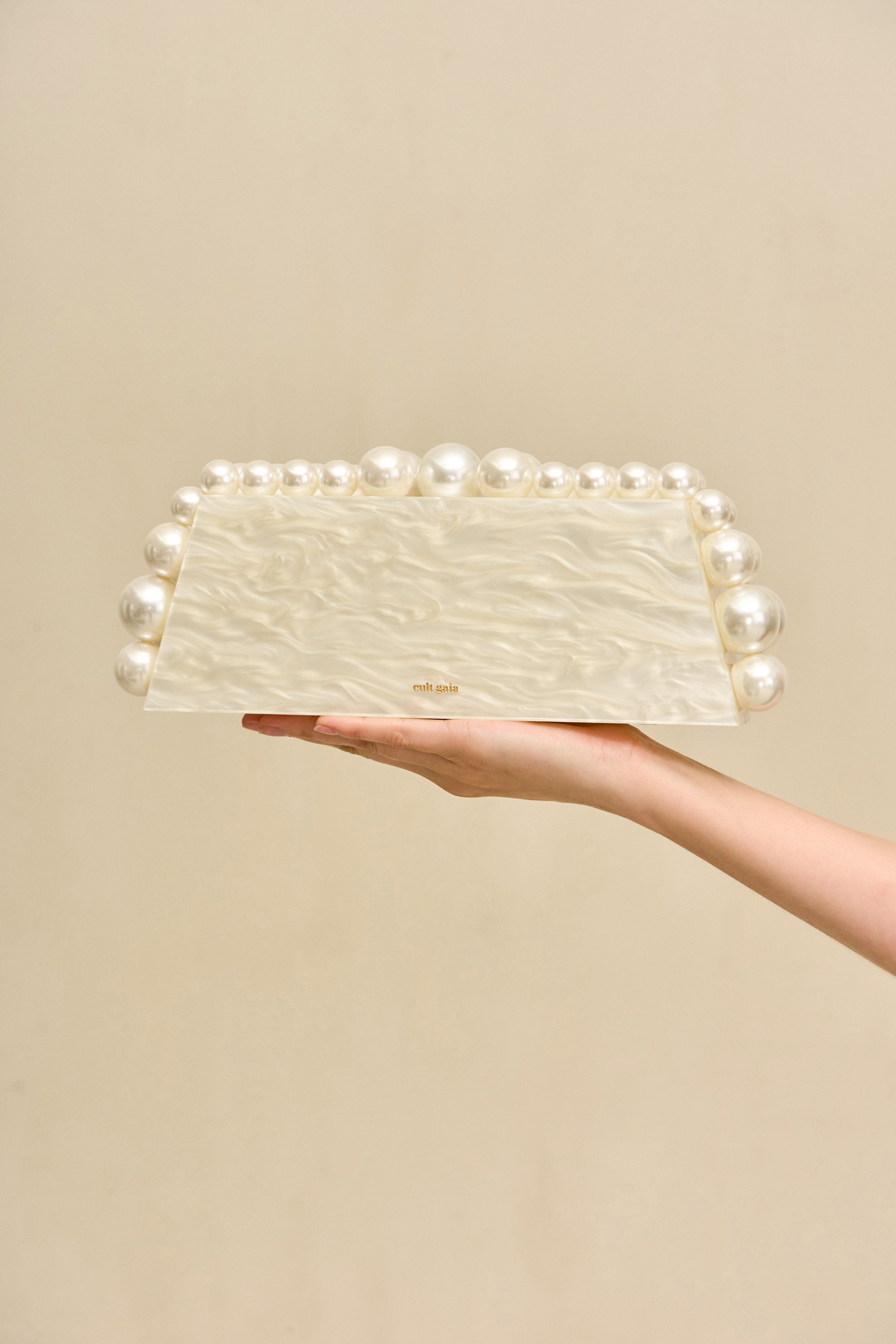 EOS LUNGO CLUTCH - IVORY