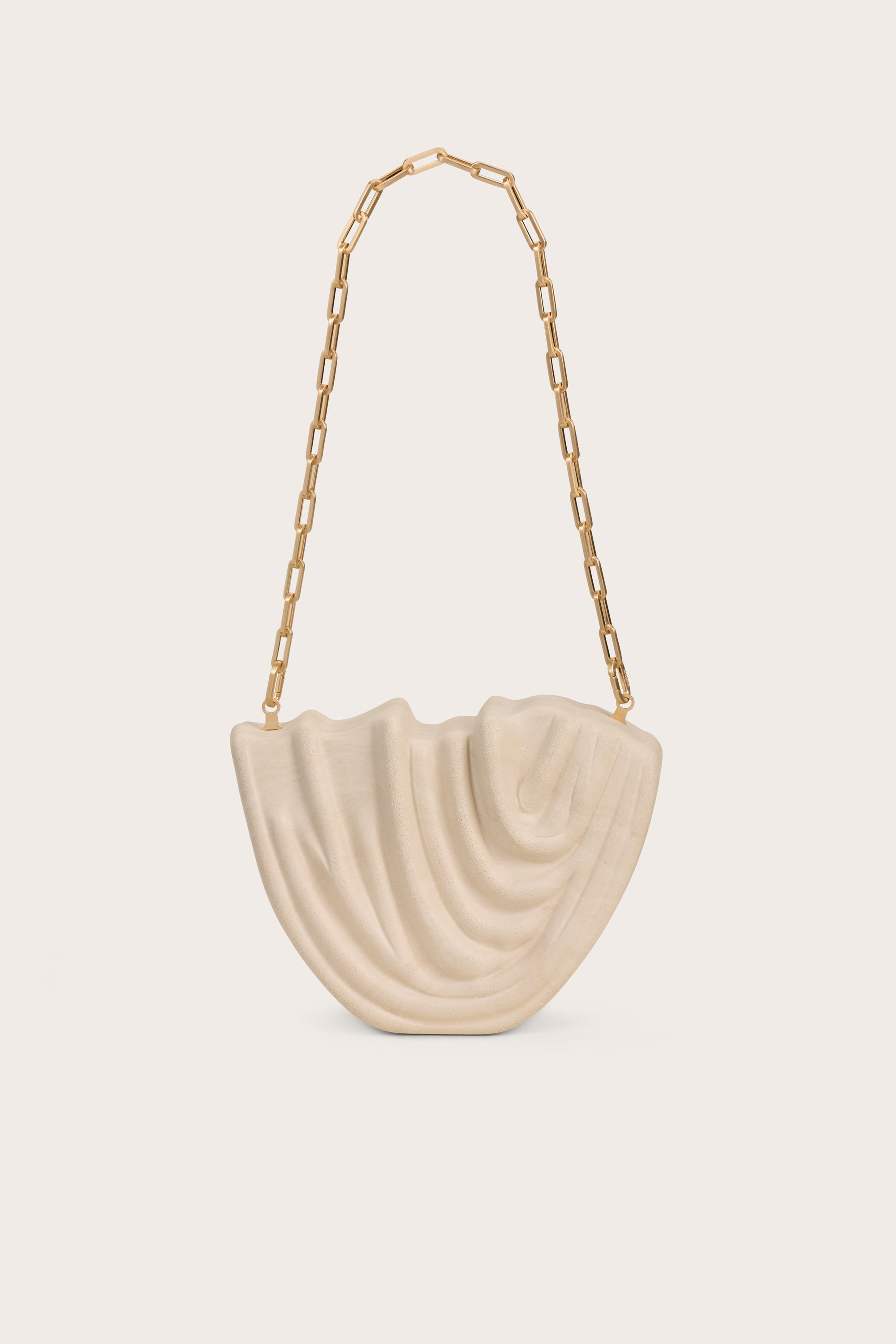 VENUS CLUTCH - TRAVERTINE