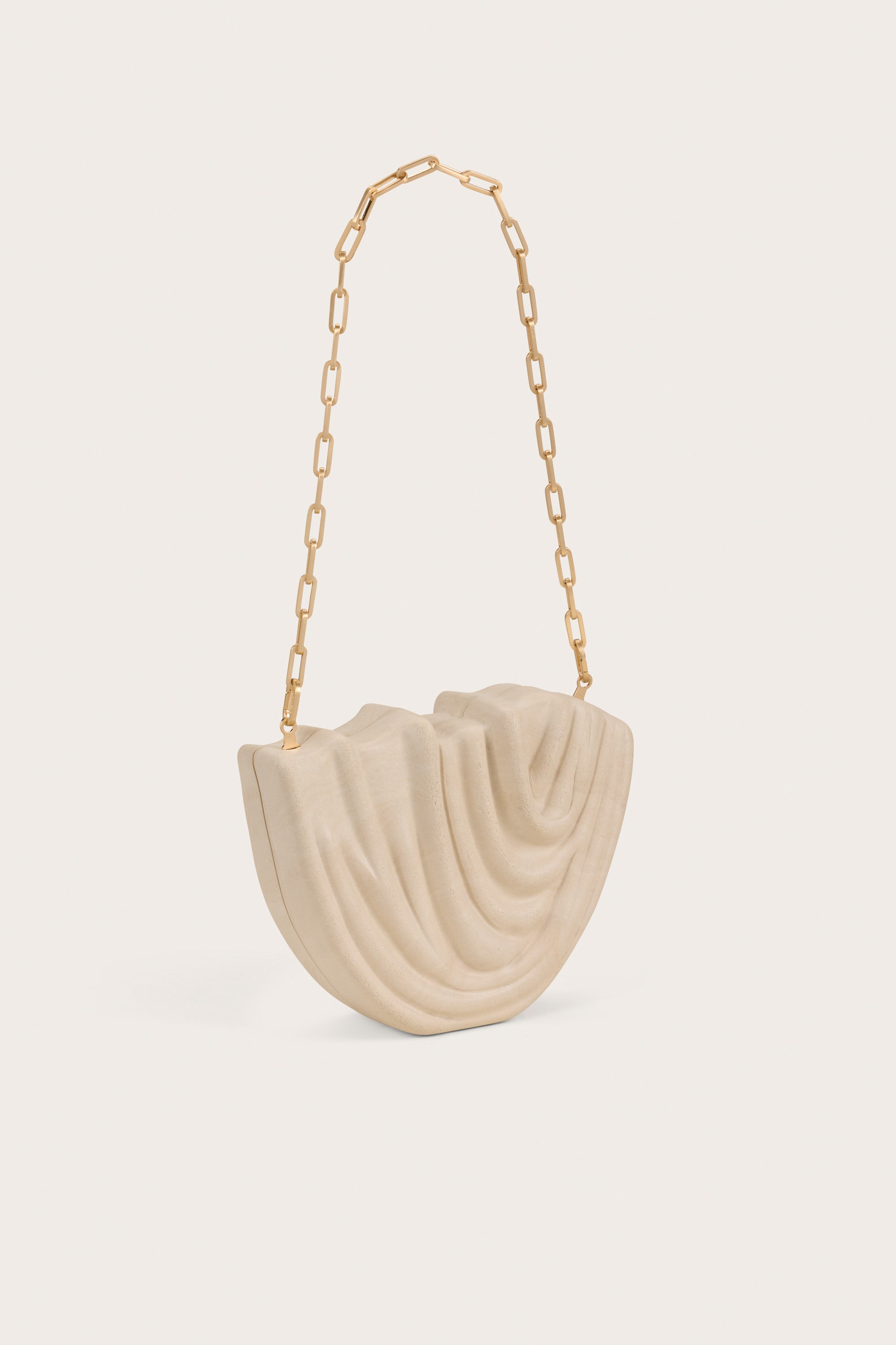 VENUS CLUTCH - TRAVERTINE